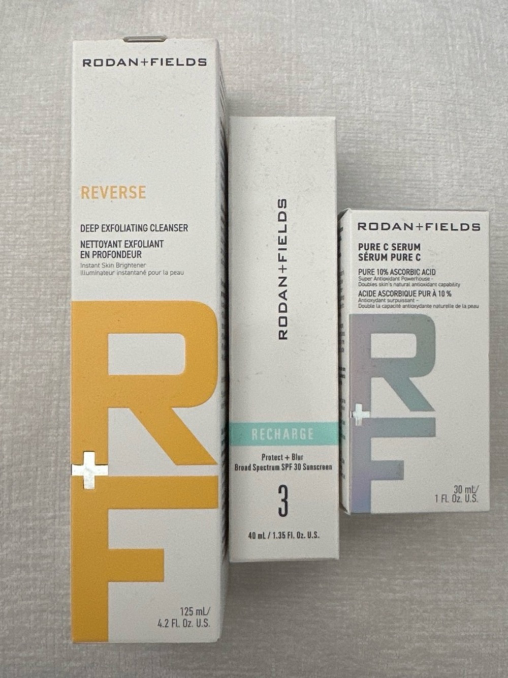 Rodan + Fields skincare set with 3 products